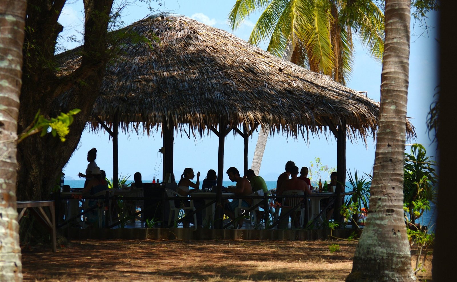 Guests enjoying the open-air pavilion at The Pansand Resort